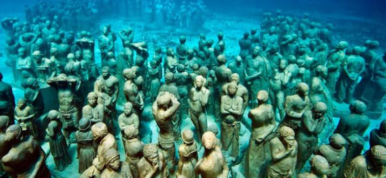 Snorkel Amongst This Eerie Collection of Stone Sculptures At Cancun’s Underwater Museum