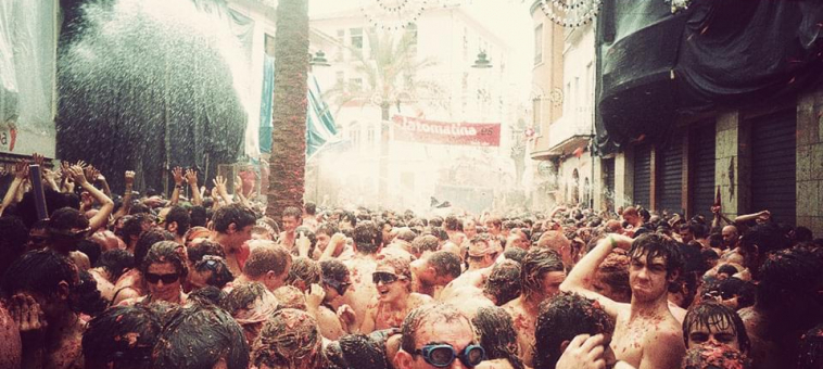 FOOD FIGHT! Get Messy In The Streets of Valencia, Spain During La Tomatina Festival…